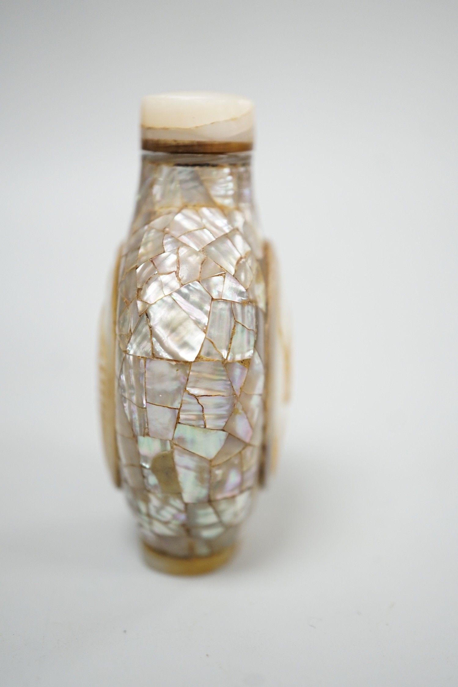 A Chinese shell and mother of pearl snuff bottle, Tongzhi mark probably later, 6.2 cm high including stopper